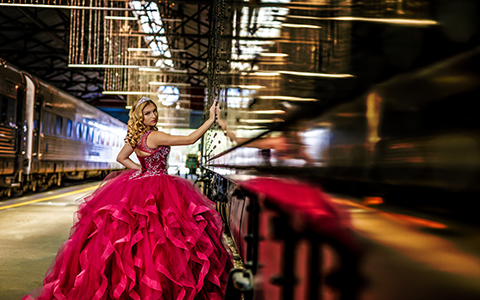 Quinceanera photography on on train, red dress, Morilee
